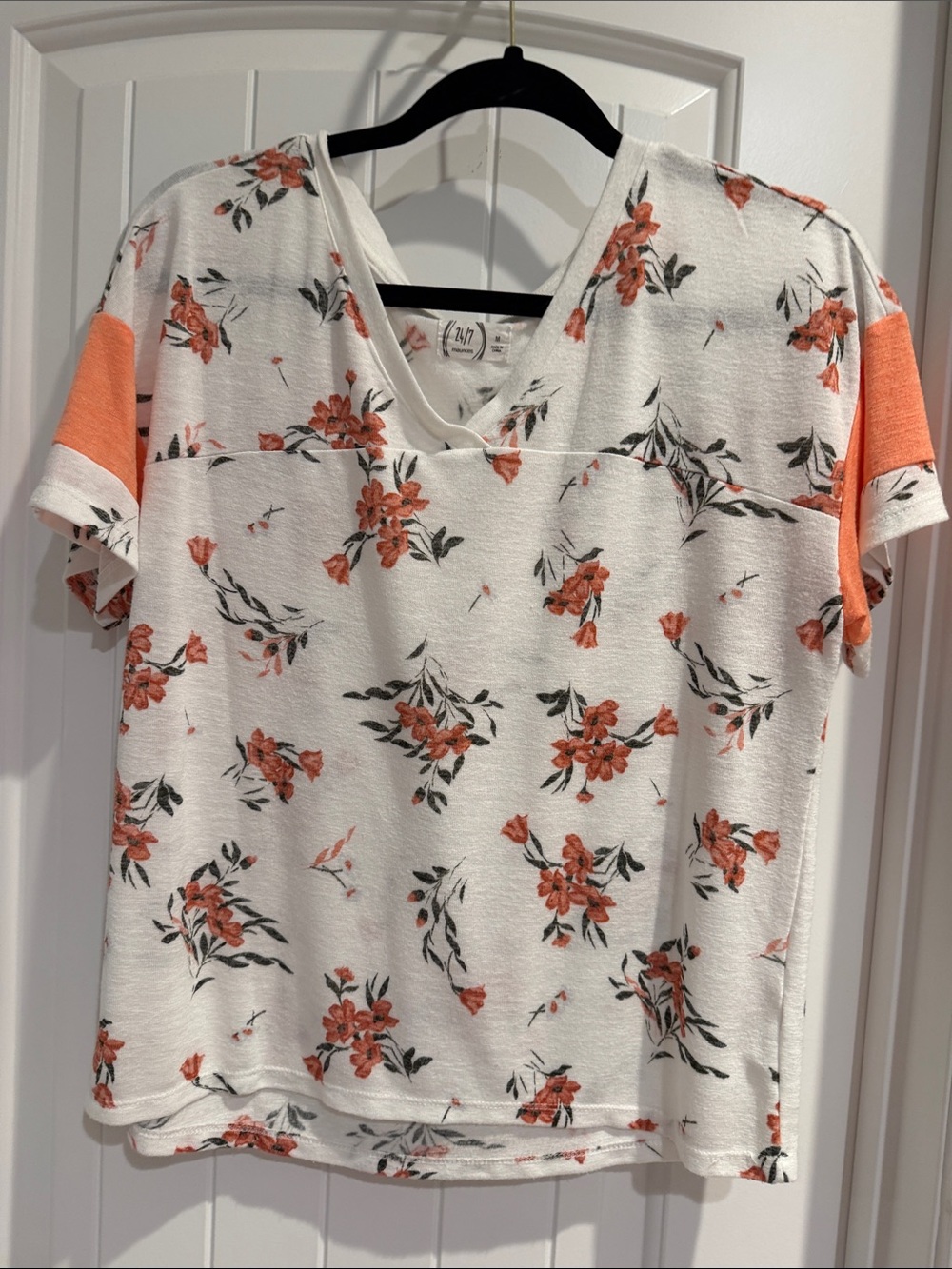 24/7 Maurice’s White V-Neck Tee with Coral Floral Print and Coral Sleeve Accents
